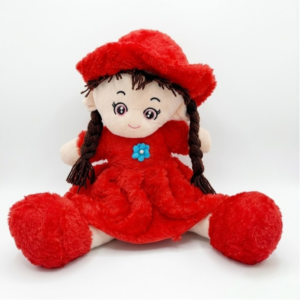 A plush girl doll with long dark braids, wearing a solid red plush hat and dress.