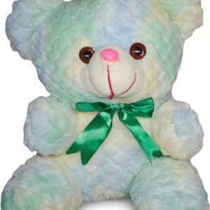 A seated white plush bear toy patterned with unique pastel blue and green mottled tie-dye. It has a green satin bow.