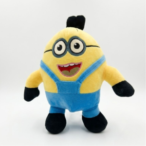 A plush Minion toy with one large eye in a goggle, wearing blue denim-style overalls.